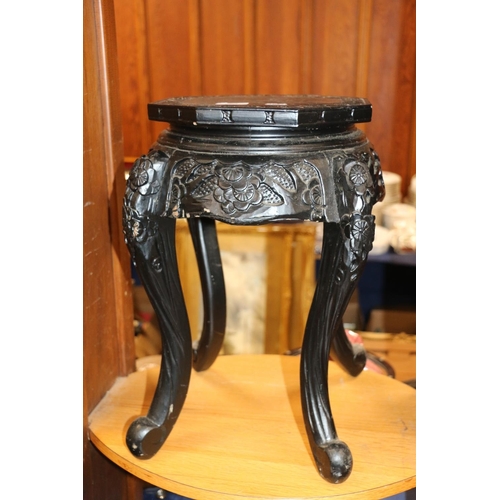 693 - Ebonised Chinese plant stand.