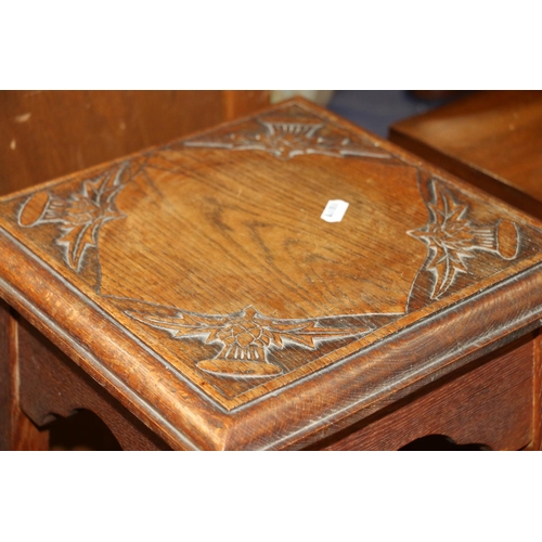 694 - Edwardian two-tier plant stand with carved thistle decoration.