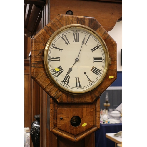 71 - Octagonal rosewood wall clock with pendulum below.