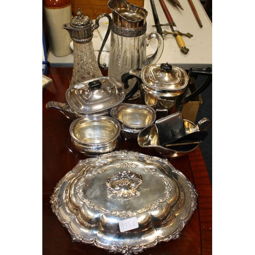 196B - Four piece silver plated tea service, glass and silver plate jug, ewer and an finely decorated entre... 