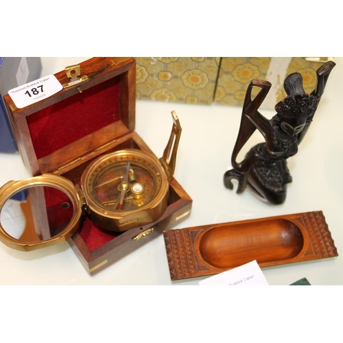 187 - Stanley of London compass, boxed, a carved Thai figure and a chip carved model of a trough by Dobbin... 