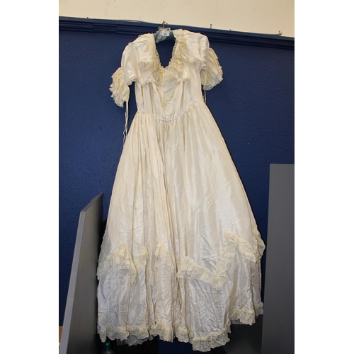 691 - Early 20th century lace wedding dress.