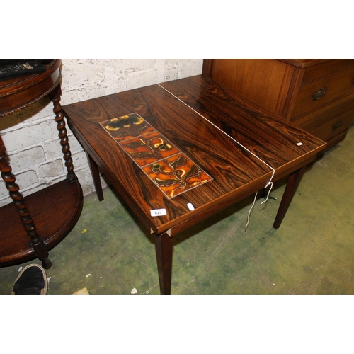 625 - Mid-20th century continental rosewood veneer coffee table with three inset ceramic tiles.