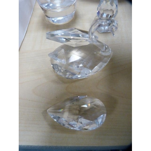 54 - Small group of glass to include a Caithness paperweight modelled as a bird, crystal liqueur glasses,... 