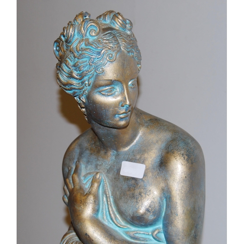 409 - Garden stoneware statue modelled as the classical goddess Venus, in scantily-clad dress, sprayed in ... 