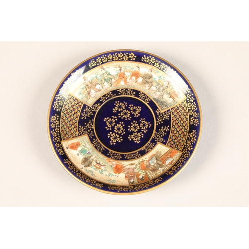 25 - Japanese Satsuma pottery cup and saucer, Meiji period (1868 - 1912) signed to base, dark blue ground... 