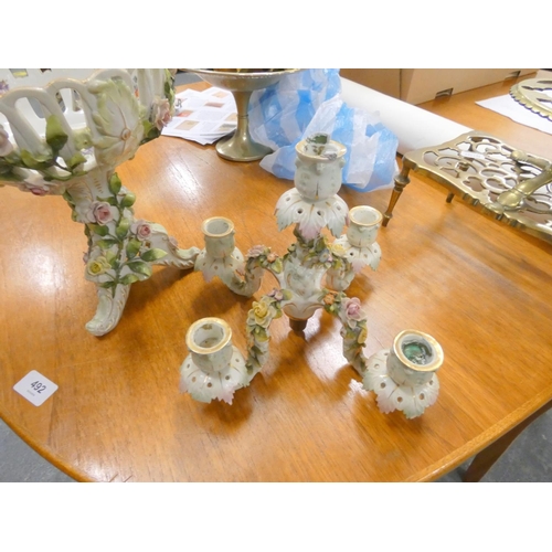 31 - German, porcelain floral,decorated centrepiece bowl and a candelabra top.