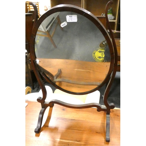 65 - Antique mahogany table top oval swing mirror.