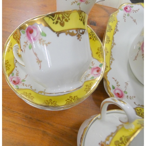 75 - Wellington China yellow and gold tea set.