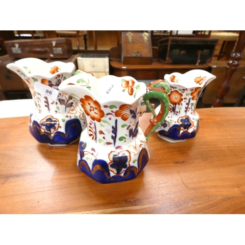 86 - Three Allerton Imari style jugs.