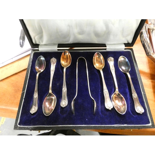 91 - Boxed set of tea spoons and tongs.