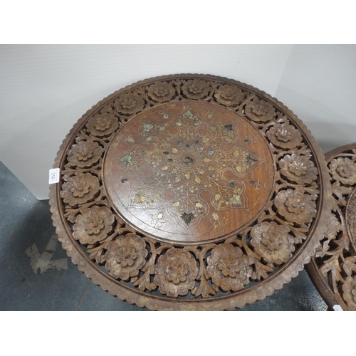 324 - Three Indian carved teak occasional tables.