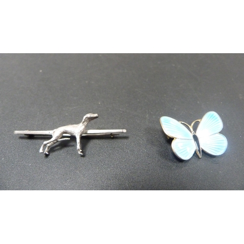 233 - Norwegian silver gilt and blue guilloché enamel butterfly brooch and a sterling silver greyhound bro... 