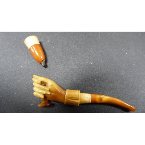 236 - Group of meerschaum pipes and cheroot holders to include a silver-mounted cheroot holder, all in fit... 