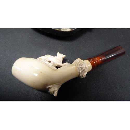 236 - Group of meerschaum pipes and cheroot holders to include a silver-mounted cheroot holder, all in fit... 