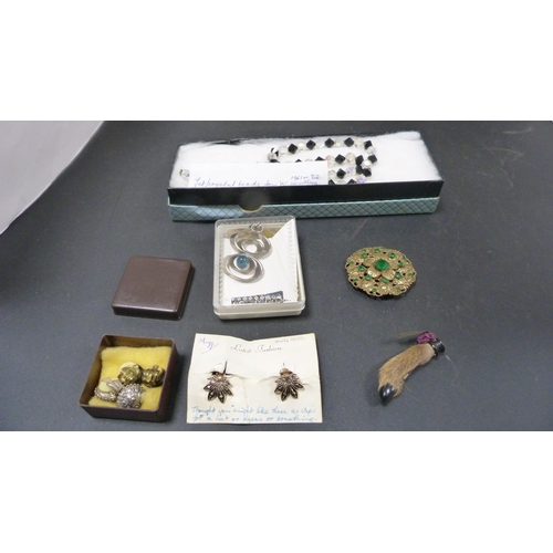 238 - Collection of costume jewellery and curios contained in a tooled jewellery box.