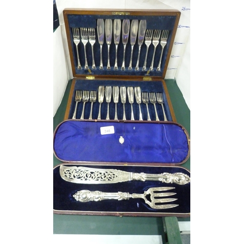 246 - Pair of EP fish dividers in fitted case, and a set of twelve boxed silver plated fish knives and for... 