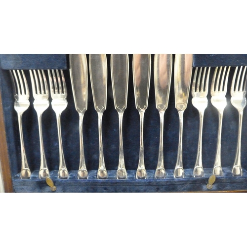 246 - Pair of EP fish dividers in fitted case, and a set of twelve boxed silver plated fish knives and for... 