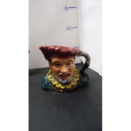 258 - Large Royal Doulton character jug modelled as Robinson Crusoe, small Royal Doulton character jug 'Th... 