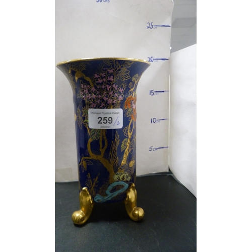 259 - Two Wilton Ware vases, one example decorated in colourful enamels.  (2)