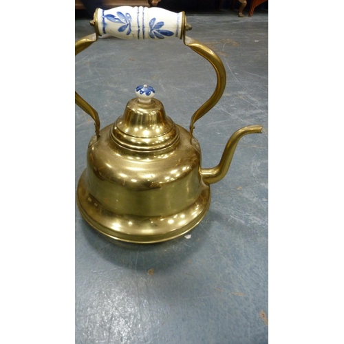 26 - Large Eastern brass kettle on oak jardinière stand.