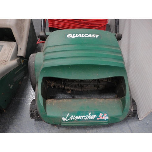 316 - Qualcast System 300 lawnmower with Qualcast Lawnraker 32.  (2)