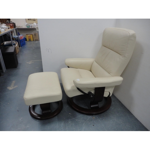 320 - Stressless cream leather reclining armchair with footstool.