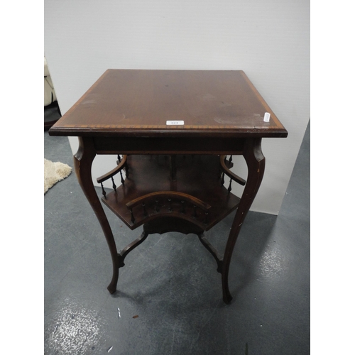 323 - Edwardian inlaid mahogany book table.