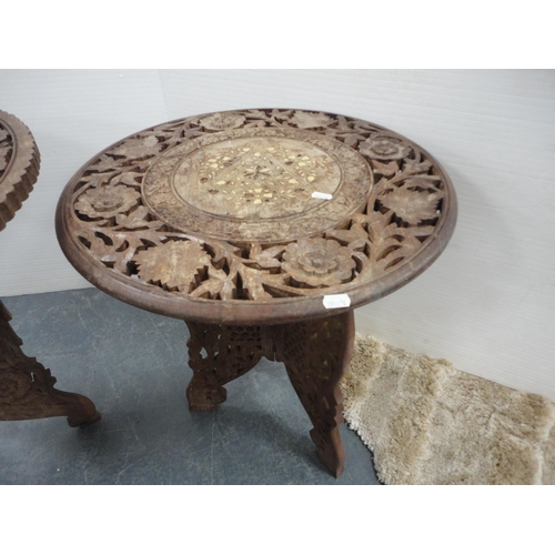 324 - Three Indian carved teak occasional tables.