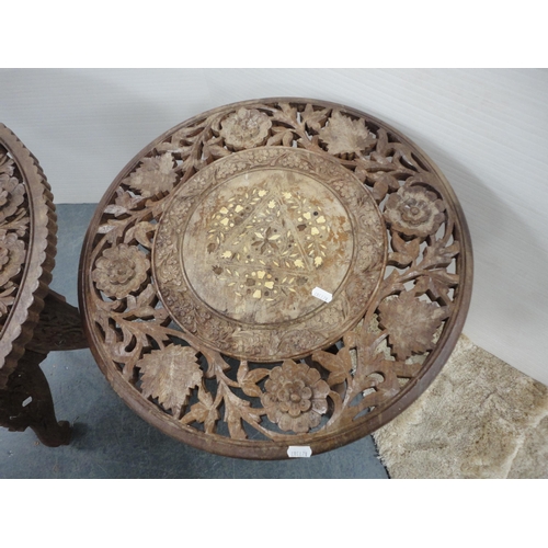 324 - Three Indian carved teak occasional tables.