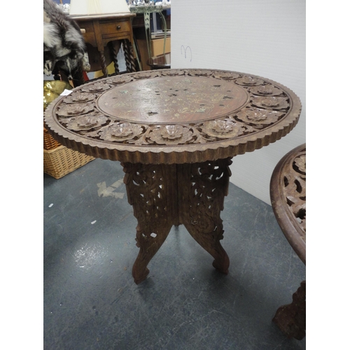 324 - Three Indian carved teak occasional tables.