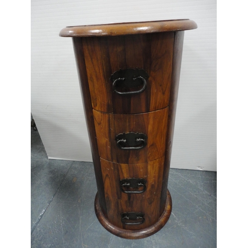 339 - Contemporary hardwood cylindrical apothecary-style chest of drawers.