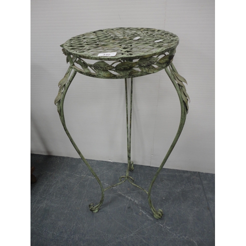 340 - Garden wrought iron plant stand and a modern oval coffee table.