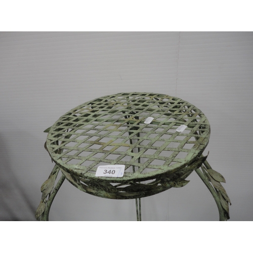 340 - Garden wrought iron plant stand and a modern oval coffee table.