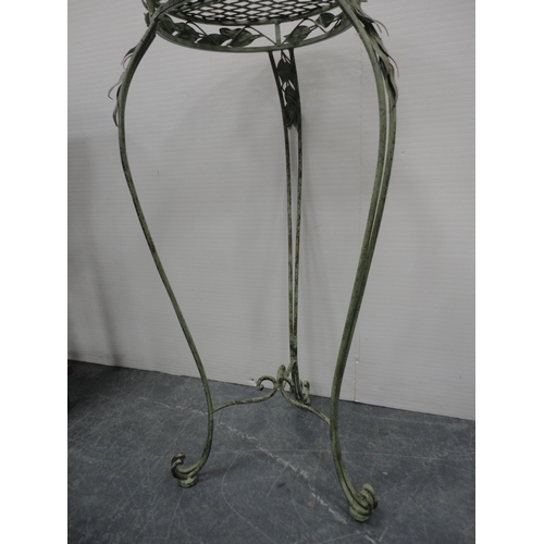 340 - Garden wrought iron plant stand and a modern oval coffee table.