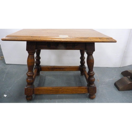 346 - Jointed oak stool and a Gothic-style oak plant stand.  (2)