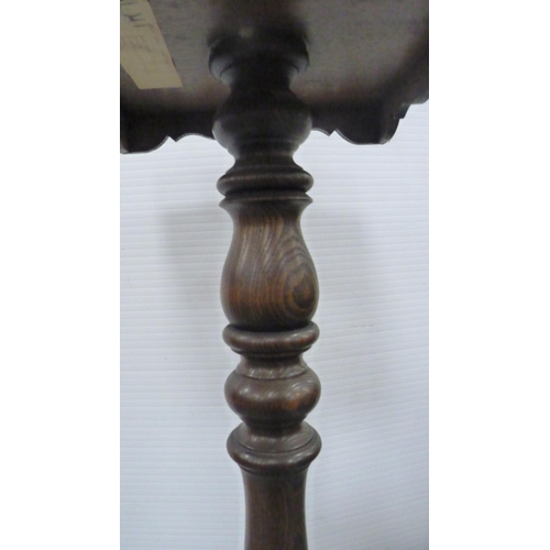 346 - Jointed oak stool and a Gothic-style oak plant stand.  (2)