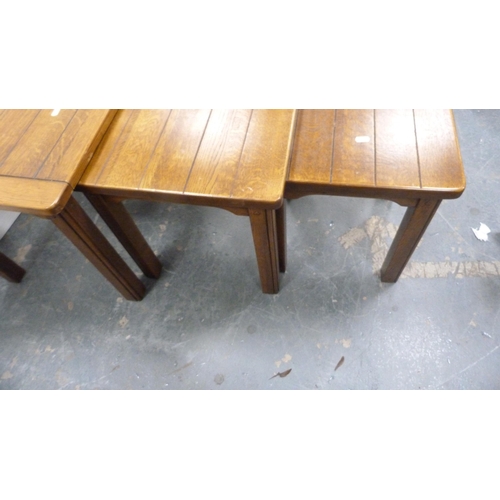 358 - Contemporary oak nest of three tables.