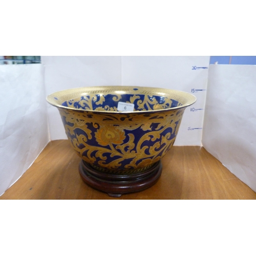 6 - Arts & Crafts-style blue ground gilt decorated bowl on stand.