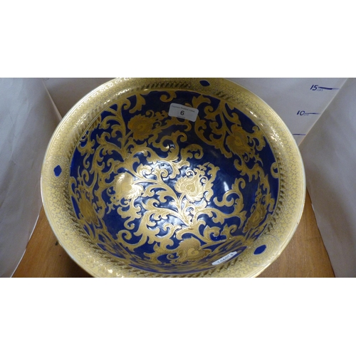 6 - Arts & Crafts-style blue ground gilt decorated bowl on stand.