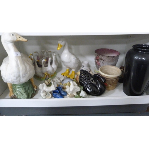 71 - Large model of a duck, another duck figure, two Spanish dove figures and other decorative ceramics.