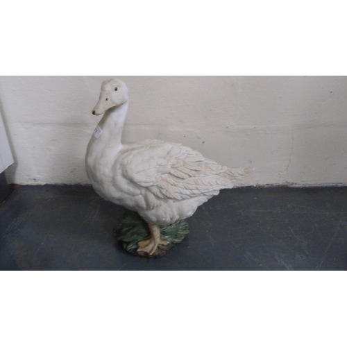 71 - Large model of a duck, another duck figure, two Spanish dove figures and other decorative ceramics.