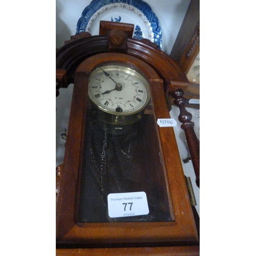 77 - Two clocks, EP cake baskets, EP tea caddy, jug etc (one shelf).