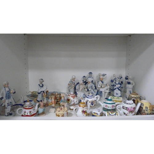 79 - Collection of Continental miniature teapots, patch boxes, Peter Rabbit figures and other continental... 