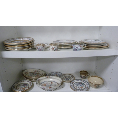 81 - T Till & Son 'Shanghae' pattern part dinner service (two shelves).