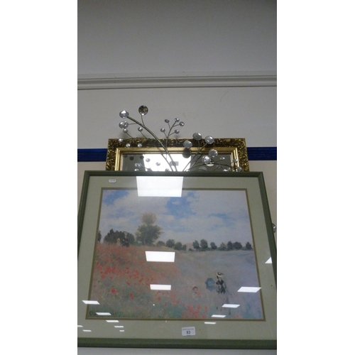 83 - Reproduction gilt framed wall mirror, print after Monet and a contemporary wall hanging.  (3)