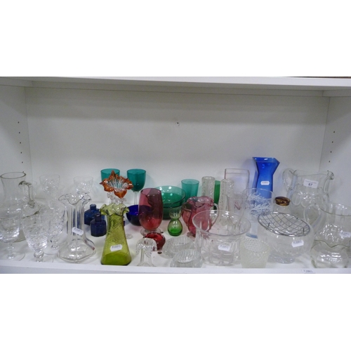 87 - Collection of coloured and other glassware to include cranberry and green glass, jugs, vases, finger... 