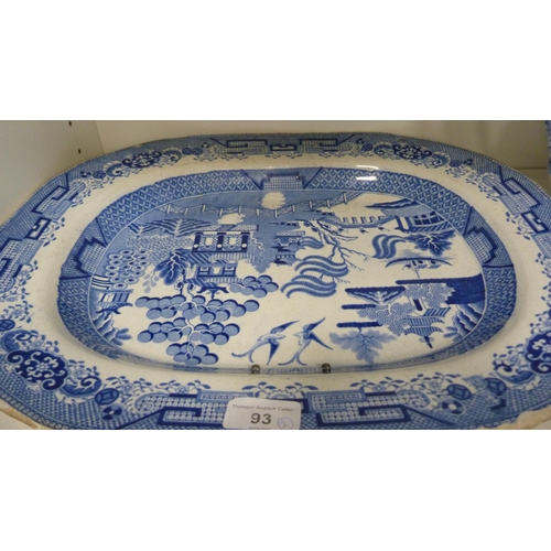 93 - Collection of blue and white to include a Victorian ashet, 'Old Chelsea' pattern dish etc (two shelv... 