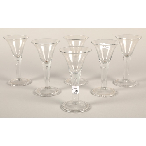 138 - Set of six antique wine glasses with bell shaped bowls with air tear and folded foot