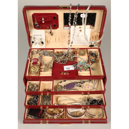 147 - A jewellery box containing costume jewellery to include beads, pendants etc